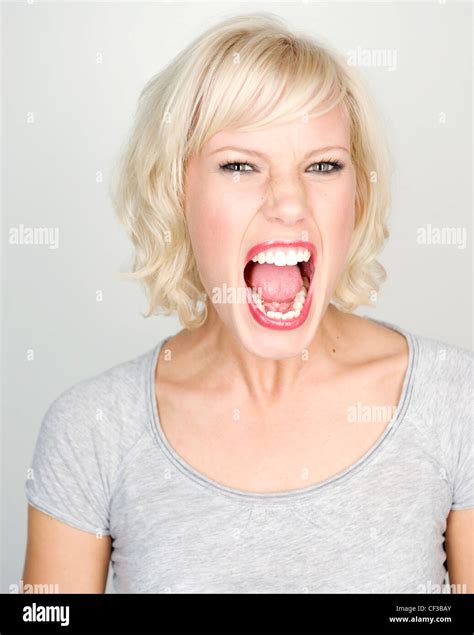 Female with mouth wide open Stock Photo - Alamy