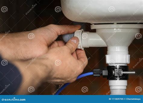 Professional Plumber Fixing Sink, Stock Image - Image of maintenance, handyman: 111839705