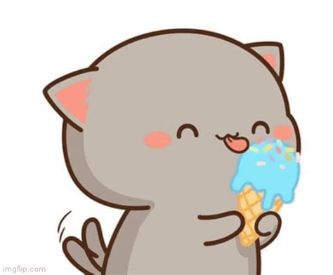 a cat eating an ice cream cone with sprinkles