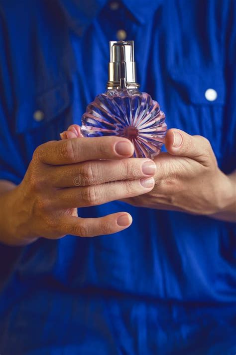 Perfume in women s hands stock photo. Image of luxury - 71532232
