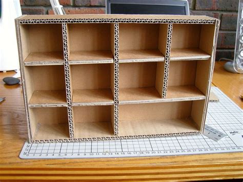 Cardboard Component Storage | Diy cardboard furniture, Cardboard box crafts, Cardboard box storage
