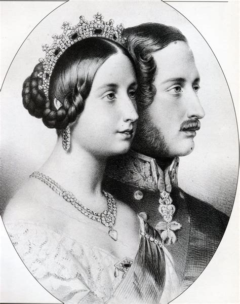 an old black and white photo of a man and woman in formal dress with tiaras