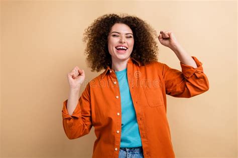 Photo of Positive Satisfied Good Mood Girl Wear Orange Stylish Clothes Dance Celebrate Victory ...