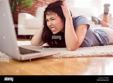 Angry woman laptop hi-res stock photography and images - Alamy