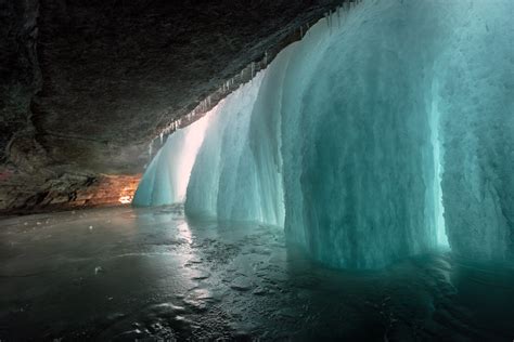 Behind the falls. Minnehaha Falls frozen in winter, Minnea… | Flickr