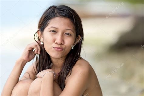 Beautiful charismatic young Filipina woman — Stock Photo © smithore #42459115