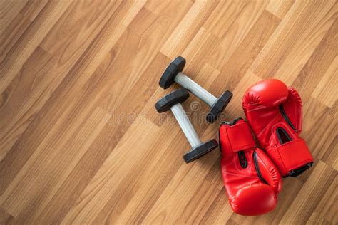 Red Boxing Gloves on a Wood Background. Stock Photo - Image of knockout, protection: 191567398