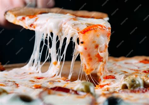 Premium Photo | Pizza with very much cheese melting