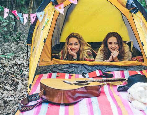 "Two Teenage Girls Camping In A Forest" by Stocksy Contributor "Kkgas ...