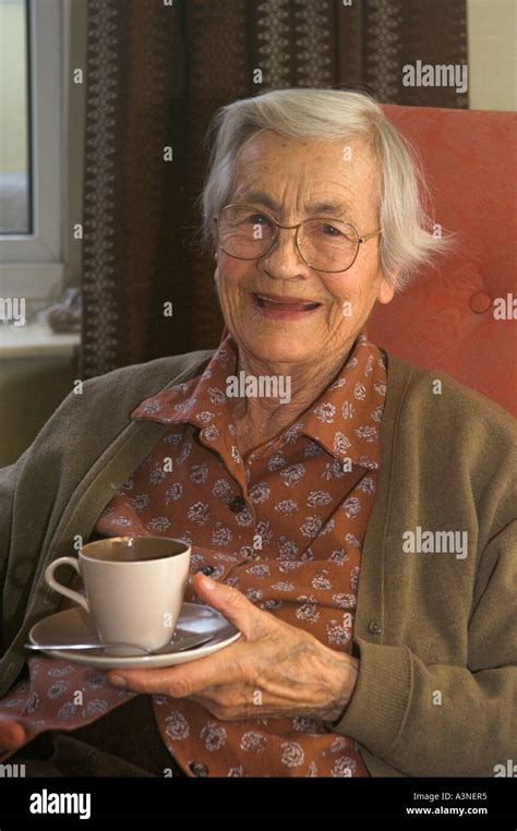 Older Woman with tea cup Stock Photo - Alamy