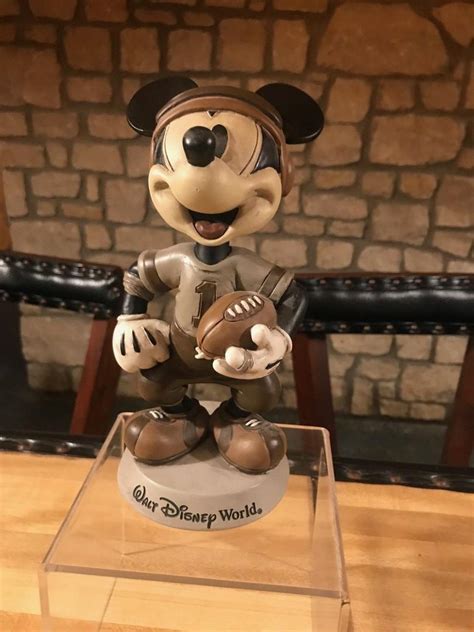 Mickey Mouse in a football uniform Bobblehead Has Been In a Plexiglass ...