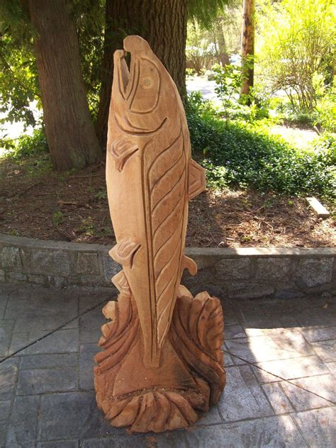 salmon carving - Google Search | Chainsaw carving, Wood carving art, Tree carving