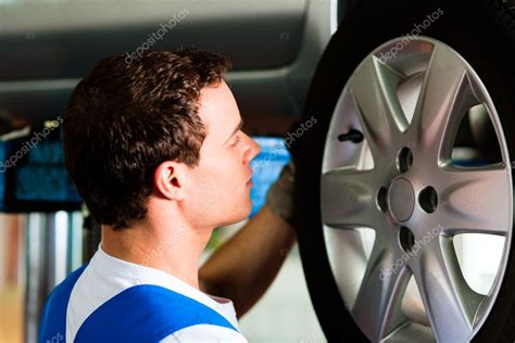 Auto mechanic in his workshop — Stock Photo © Kzenon #5023345