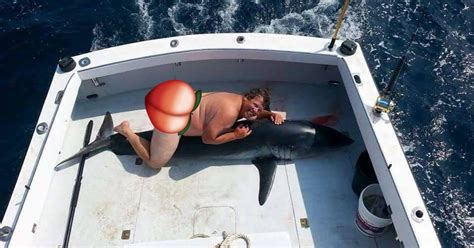 The naked guy on the shark has been identified. (It's not Jim McElwain ...