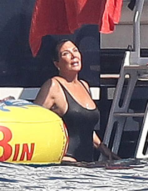 Kris Jenner flaunts her curvy physique in black swimsuit | Daily Mail Online