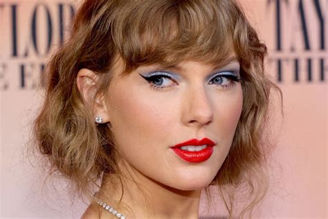 What lipstick brand does Taylor Swift wear to create her signature red lip?