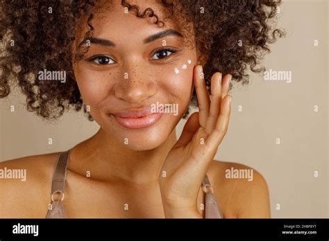 Pretty lady getting skin anti-aging treatment, indoors Stock Photo - Alamy