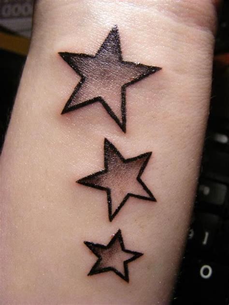 Black stars | Star tattoos for men, Star tattoo on wrist, Cool wrist tattoos