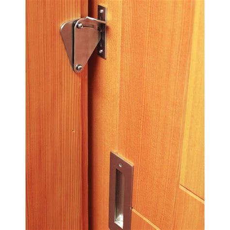 Intended for interior applications, the teardrop privacy barn door locking latch is primarily ...