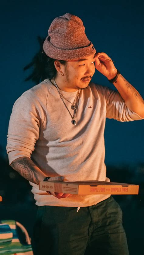 Man Holding a Pizza Box · Free Stock Photo