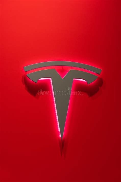 Tesla Logo Against Red Background. Tesla Motors Editorial Photo - Image ...