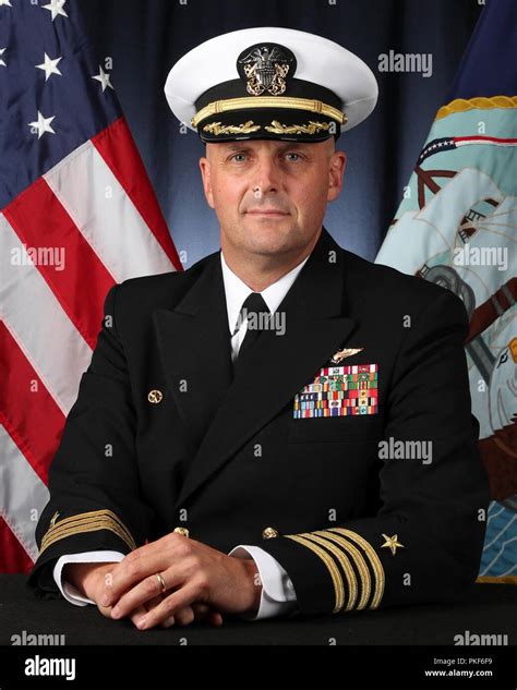 Studio portrait of USS Gerald R. Ford (CVN 78) Commanding Officer Capt. John J. Cummings Stock ...