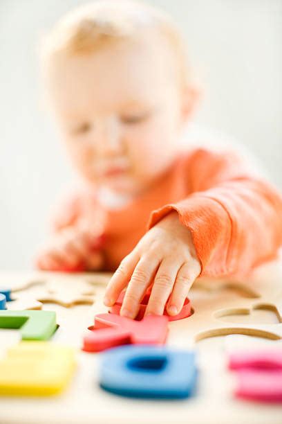 8,000+ Baby Puzzle Stock Photos, Pictures & Royalty-Free Images - iStock