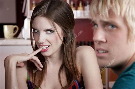 Woman flirting with male friend Stock Photo by ©creatista 39774369