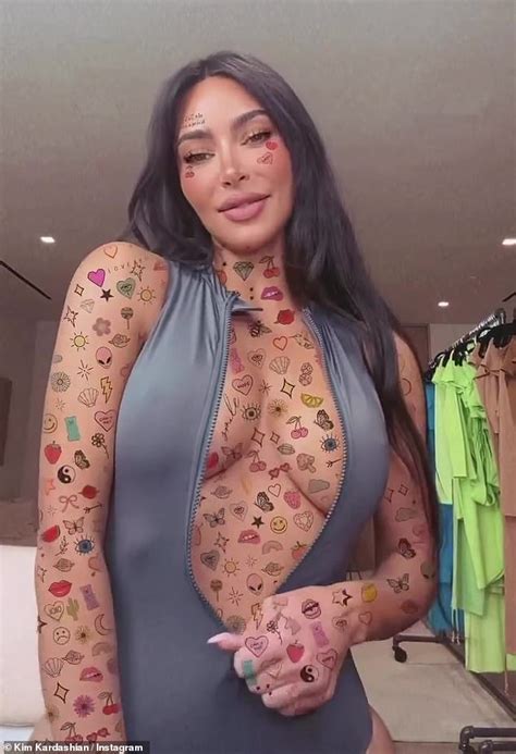 Kim Kardashian showcases fake tattoos in plunging swimsuit after proudly ... trends now