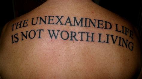 Typographic Tattoos (tattoolit: The unexamined life is not worth...)