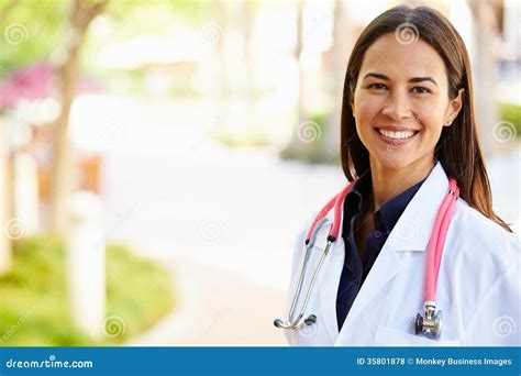 Outdoor Portrait of Female Doctor Stock Photo - Image of smiling ...