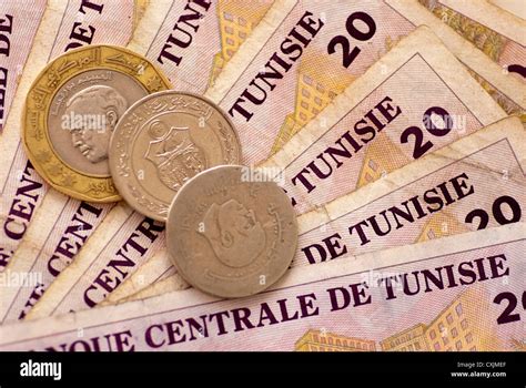 Tunisian Coins on Twenty Dinar Notes Stock Photo - Alamy