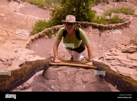 Visitors at Gila Cliff Dwellings National Monument can use traditional ladders to explore the ...