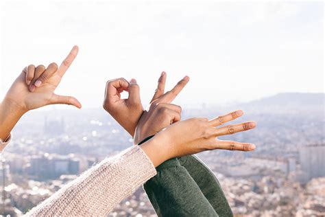 "Couple Making "love" Sign With Their Fingers Above City." by Stocksy Contributor "BONNINSTUDIO ...