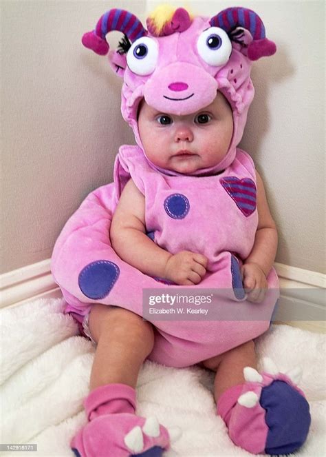 Baby Wearing Pink Monster Costume High-Res Stock Photo - Getty Images