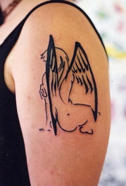 Black ink silhouette angel tattoo on shoulder - Tattooimages.biz