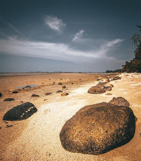 Photo Of Rocks On Seashore · Free Stock Photo