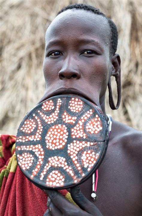 Lip Stretching: A Culture Of The Surma Tribe.... - Ibiene Magazine