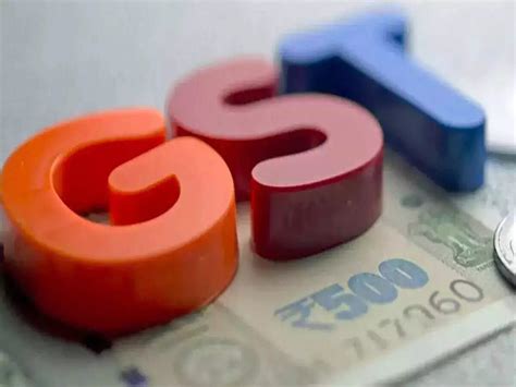 gst news highlights gst council okays  tier tax structure
