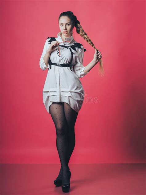 Submissive Women Latex Pencil Dress Stock Photos - Free & Royalty-Free