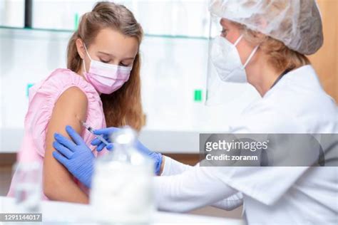 Flu Shot Nurse Mask Photos and Premium High Res Pictures - Getty Images