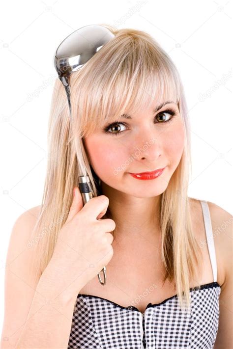 Young woman first time cooking Stock Photo by ©mihhailov 19269111