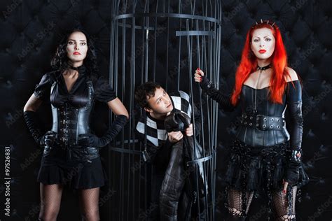 girls mistress dominate man   cell stock foto adobe stock
