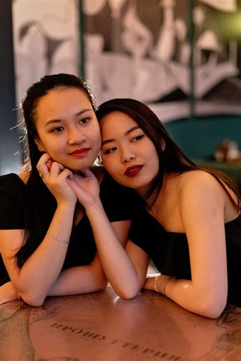 Two Women Sitting at the Table · Free Stock Photo