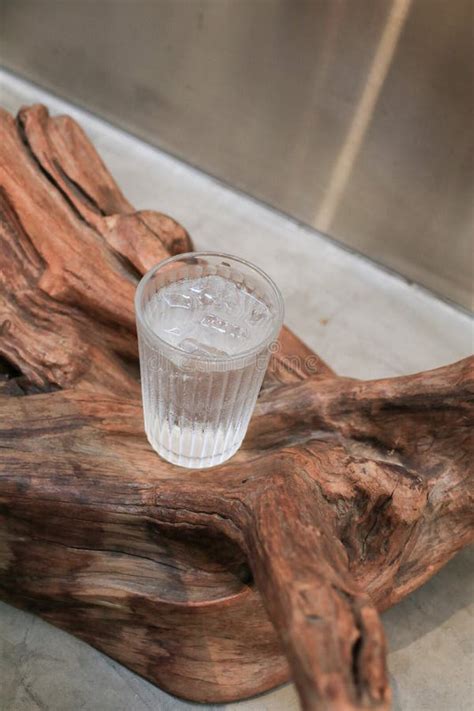 Glass of Ice Water on Wooden Timber Decoration. Cold Water Stock Photo ...