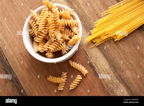 dried italian spiral fusilli  spaghetti pasta stock photo alamy