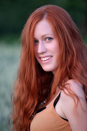 Young Woman With Long Hair Portrait Stock Photo - Download Image Now