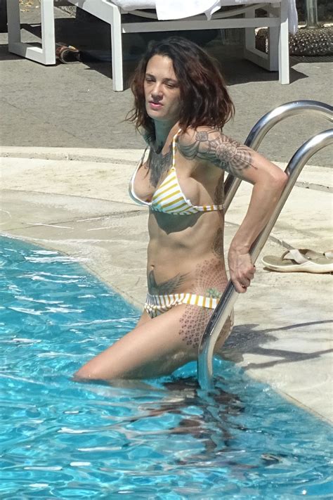 ASIA ARGENTO in Bikini and Anthony Bourdain at a Pool in Rome 09/20/2017 – HawtCelebs