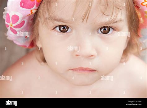 Pretty White Little Girl Close-up Look At The Camera Stock Photo - Alamy
