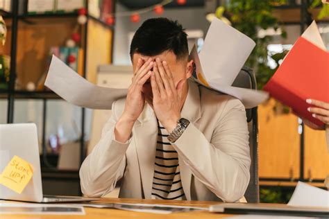 Man Stressed at Work · Free Stock Photo